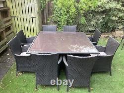 8 Seat rattan effect garden furniture set Used