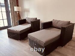 Rattan garden furniture, two lounge chairs for relaxing In